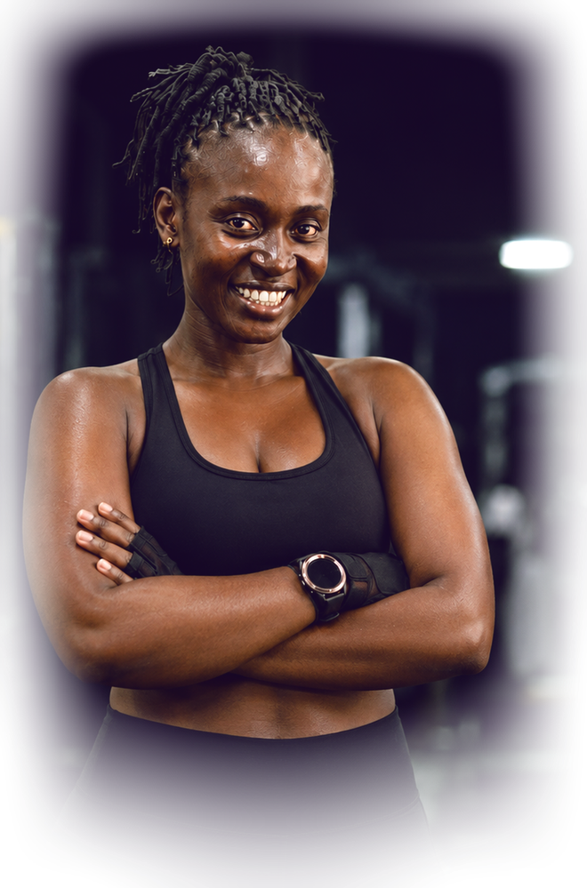 Joan, personal trainer and special populations specialist, standing in a gym